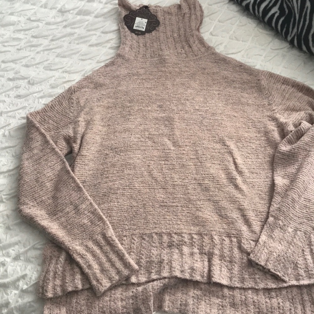 Pink turtleneck sweater